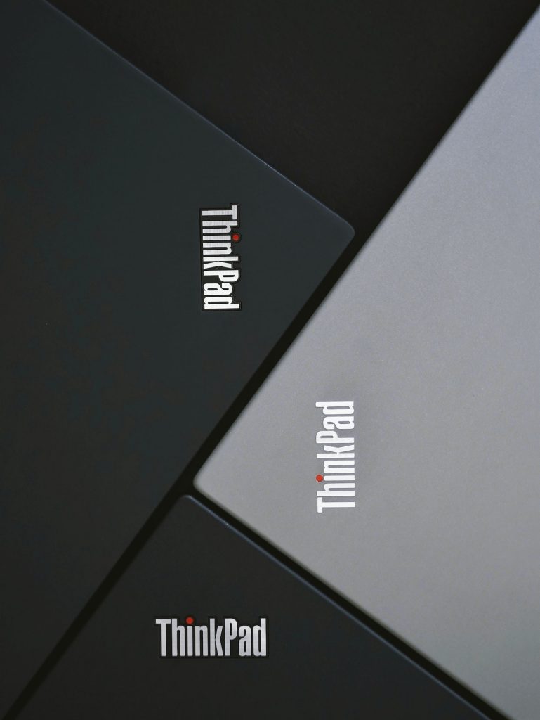 4 laptops with lenovo logos
