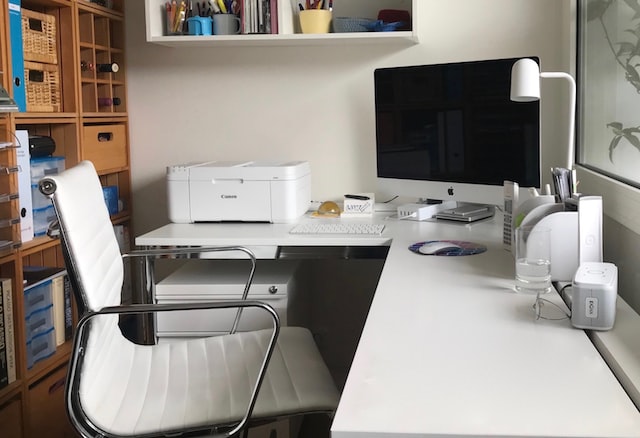 white printer setup on a desk